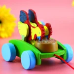 Toystorey Wooden Musical Pull Along Toy Cute Chicken Drumming Pull Along Car with Attached String Encourages Walking Pack of 1